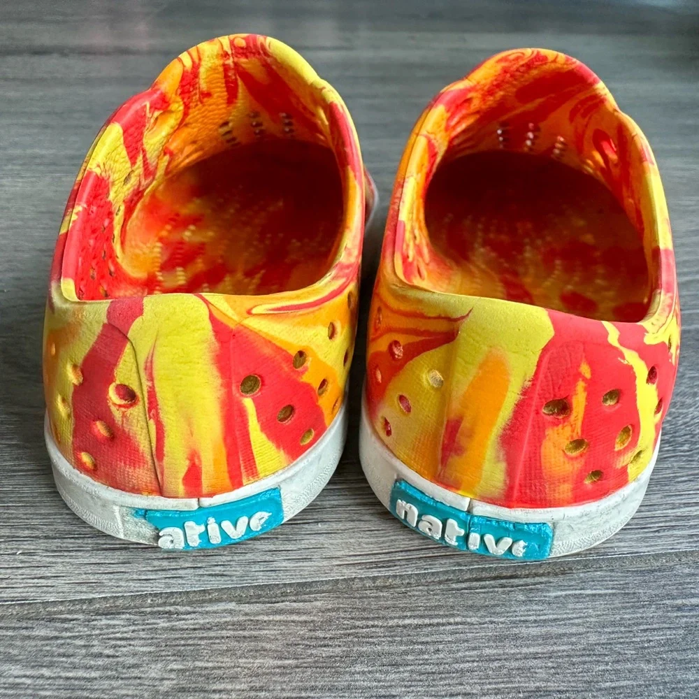 Unisex Native Shoes - yellow and orange tie-dye slip-on sneakers